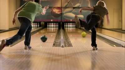 stock-footage-two-people-bowling.jpg